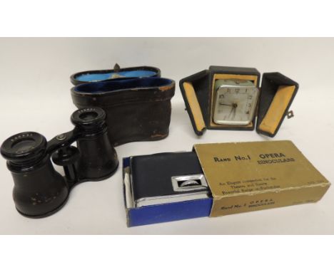 A c.1920's travelling alarm clock "Bayard" in original case; a pair of opera glasses in case and a pair of folding opera glas