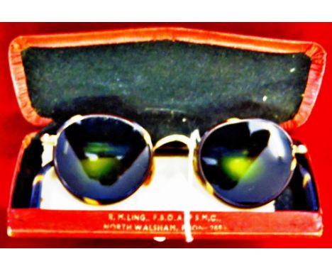 Vintage possible 1960's sunglasses with green variegated lenses. Faux tortoiseshell and gilt frame marked ALGHA. Good conditi