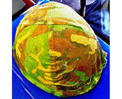 American M1 Helmet  - Vietnam war period dated 1961 with original jungle warfare camo cover. In excellent condition with a cl