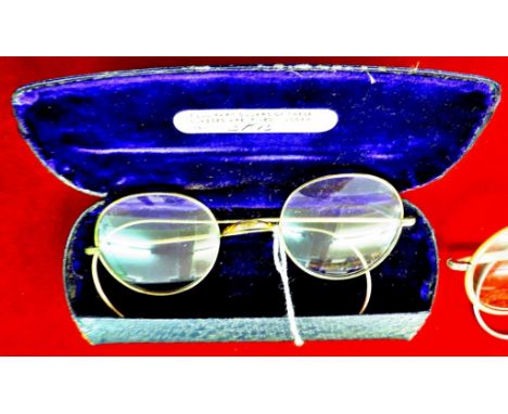 Vintage gilt-framed spectacles, Windsor marked on bridge, in original H.A. King case, fair condition.