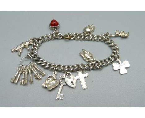 A silver charm bracelet, 32g 