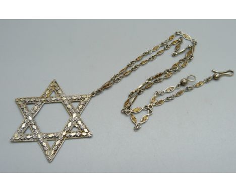 A silver Star of David pendant marked Israel and chain 