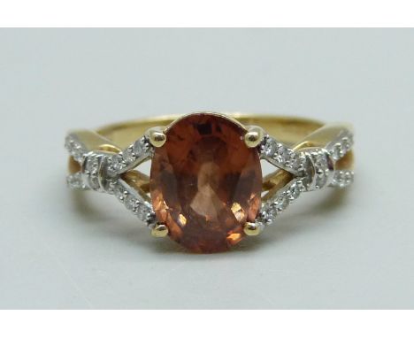 A 14ct gold Zanzibar sunburst zircon and diamond ring, 3.4g, N 