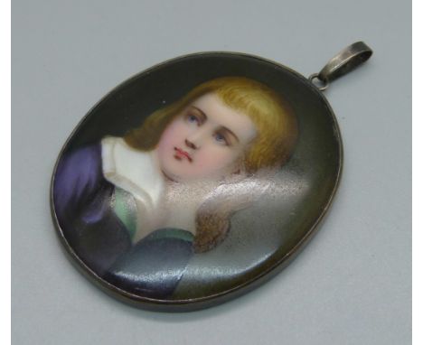 A silver framed porcelain portrait plaque, 5cm wide 