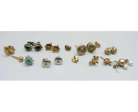 Six pairs of earrings and five single earrings, including one pair marked 9ct gold, 0.5g, and one silver pair 