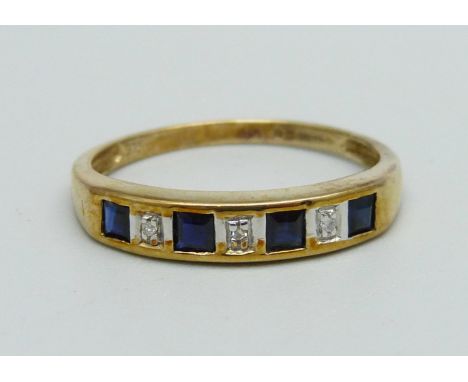 A 9ct gold ring set with four sapphires and three small diamonds, 2.2g, R 