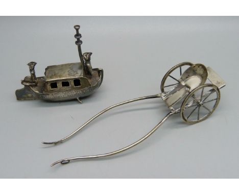 A sterling silver model boat, London import mark for 1900, Isaac Manheim importer, 28g, length 6cm, and a continental silver 