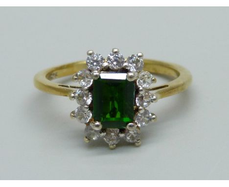 A silver gilt, green and white stone cluster ring, P 