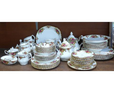 A collection of Royal Albert Old Country Roses including a cake stand, fourteen side plates, six bowls, a mug, a thimble, a s