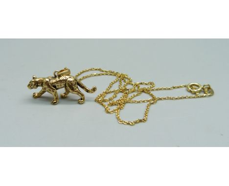 A silver gilt leopard pendant on chain 