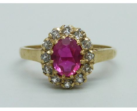 A 9ct gold, ruby and zircon cluster ring, 2.3g, O/P 