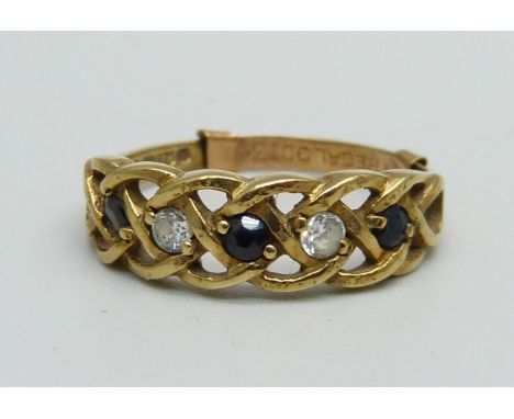 A 9ct gold, sapphire and zircon ring with sizing clip, 2.5g, Q 