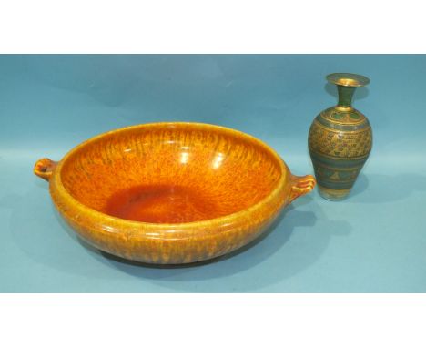 A Royal Lancastrian orange-glazed ceramic crocus bowl, 32cm diameter and a green and gilt-glazed pottery vase by Mary Rich, (