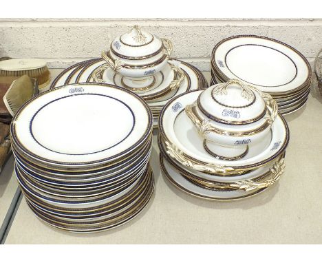A collection of 19th century Minton dinnerware, decorated blue and gilt, approximately thirty pieces: sauce tureen and cover 