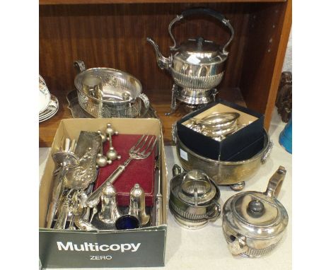 A plated spirit kettle on stand with burner, a three-piece bachelors plated tea service, various cutlery and other plated war