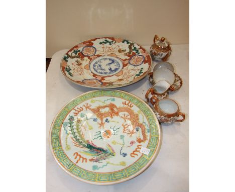 Two Oriental ceramic chargers, 42cm and 34cm diameter and a Japanese eggshell tea part-service. 