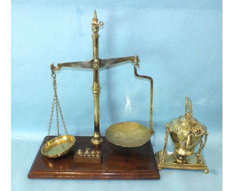 A set of W &amp; T Avery brass Class B balance scales on mahogany base, 60cm high, together with a set of brass weights in wo