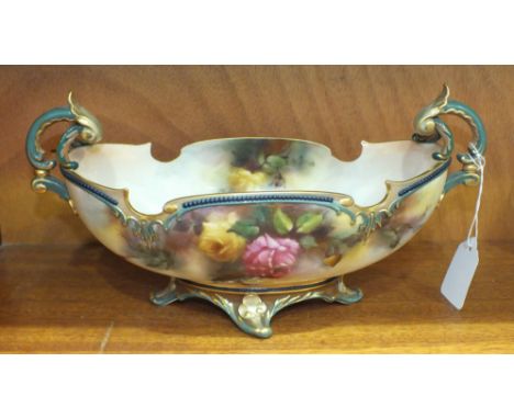 A Royal Worcester Hadley Ware two-handled oval-shaped dish decorated with roses and butterflies, signed M Blake, factory and 