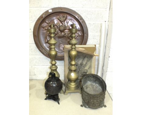 A vintage carved coconut tea caddy with elephant-finialled lid, on elephant supports, 26cm high, a pair of brass candlesticks