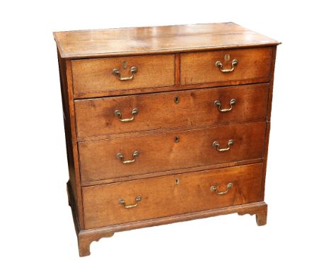A George III oak chest of two above three drawers with original brass swing handles, standing on bracket feet, 94cm H x 51cm 