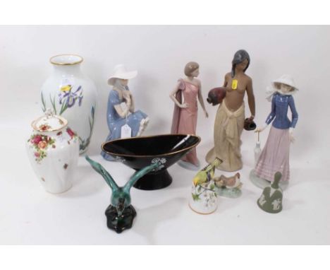 Lladro figure - lady carrying vessels, three Nao figures and decorative china