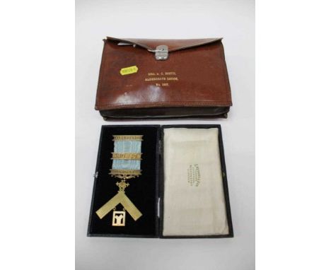 Aldersgate Masonic items including bag and sash in leather case, and a jewel relating to Bro. A. C. Booth, with silver gilt m