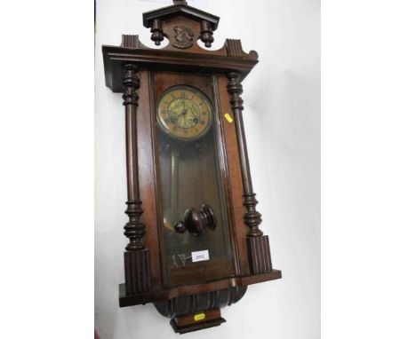 Late 19th century mahogany Vienna style wall clock with carved profile portrait