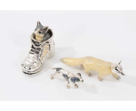 Three silver and enamel miniature animals to include a fox, 5.2cm long, dog, 3.5cm long and kitten inside a boot, 3.5cm longC