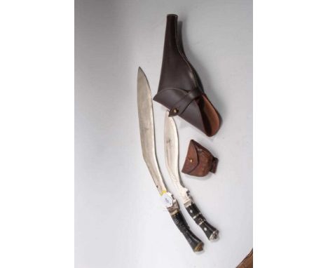 Very large Gurkha Kukri, the blade 51cm in length marked India, together with another Kukri, brown leather holster and a Firs