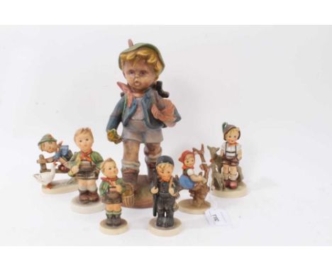 Six Hummel figures and one similar larger figure