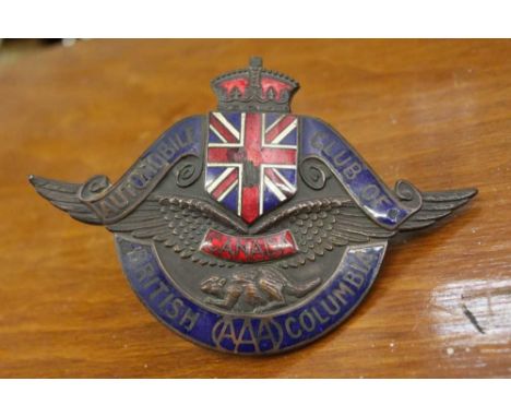 Scarce enamelled Canadian Automobile Club of British Columbia car badge together with a group of Ford Cortina Manuals and oth