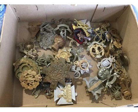 Collection of approximately 50 British Military cap badges including Army Cyclist Corps, RAMC and 12th Lancers (some copies n
