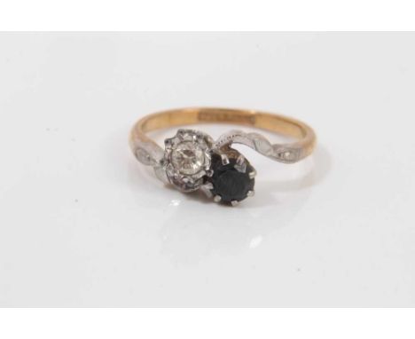 18ct gold diamond and sapphire crossover ring in platinum claw setting, size KCondition report: Shank stamped 18ct PLAT and w