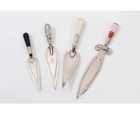 White metal sword bookmark with banded agate handle, 10.5cm long and three silver trowel bookmarks