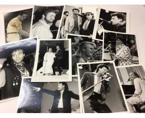 Photographs - Quantity of 1980's Pop Star Portrait and Live Aid Press release and other photographs. Stars include Freddie Me
