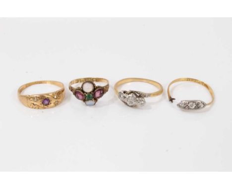 Antique 12ct gold gem set ring, size K½, 18ct gold diamond three stone crossover ring, size O½, one other similar (broken) an