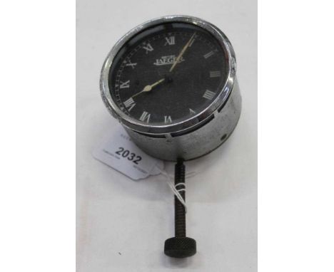 Vintage car clock by British Jaeger with black Roman numeral dial
