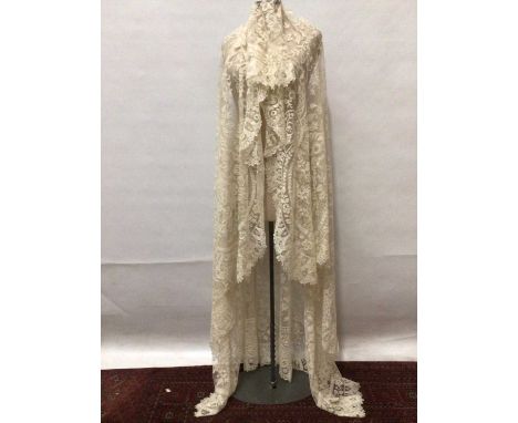 Antique wedding Veil, net ground with handmade bobbin lace scrolling flowers and scalloped edges.Condition report: Very good 