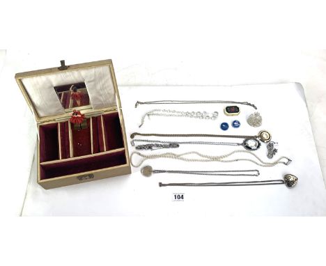 Vintage musical jewellery box with assorted dress necklaces, pearls and brooches etc. Working. 8.5" long x 6" wide x 3" high
