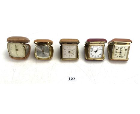 5 vintage travel clocks - 2 x Estyma, 2 x Europa and Pilot