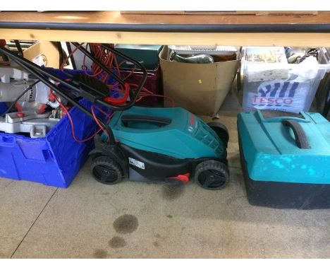 Assorted tools and a Bosch lawnmower