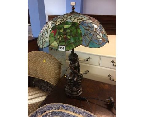 Table lamp with Tiffany style shade