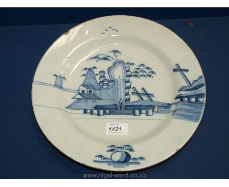 An English Delftware charger, c.1750, boldly painted in blue with a Chinoiserie rock pattern, possibly Bristol, minor wear an