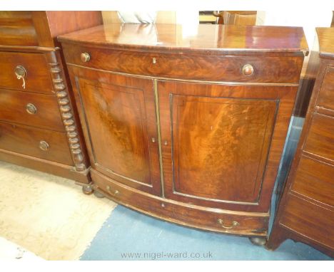 A high quality 19th c. bow fronted, cross-banded Mahogany and other woods Sideboard, the opposing flame grain veneered and eb