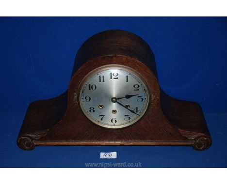 A 1920's Napoleon hat Oak cased mantle Clock with nine bar Westminster chiming movement, complete with key and pendulum, 9 1/