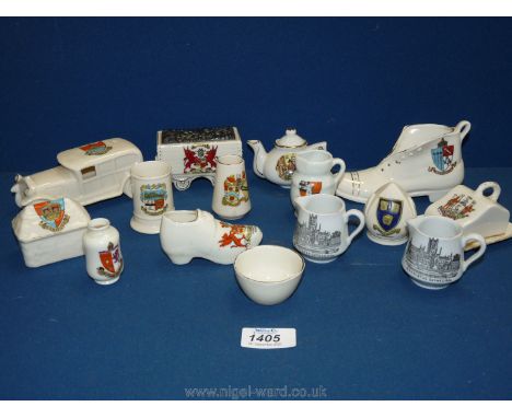 A quantity of Goss and Shelley commemorative china including boot for Redditch, large car for Mumbles, cheese dish for Liverp