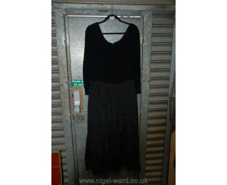 A black vintage Velvet and Taffeta long sleeved evening Dress.