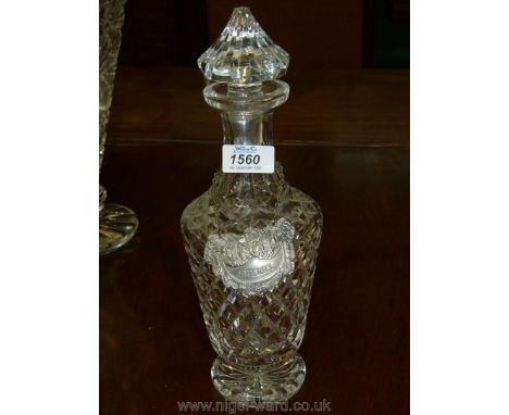 A Waterford decanter with white metal sherry label by Israel Freeman &amp; Sons.