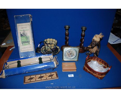 A quantity of miscellanea including wooden ethnic figure, clock, wooden candlesticks, teacup and saucer lamp, cribbage board,