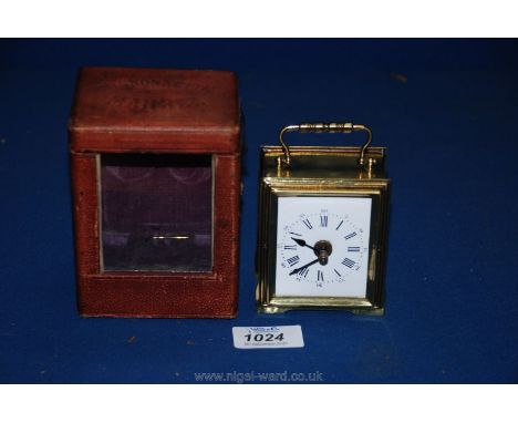A Brass Carriage Clock in leather case, circa 1900, marked C. Maurel, Paris, 5'' high overall.